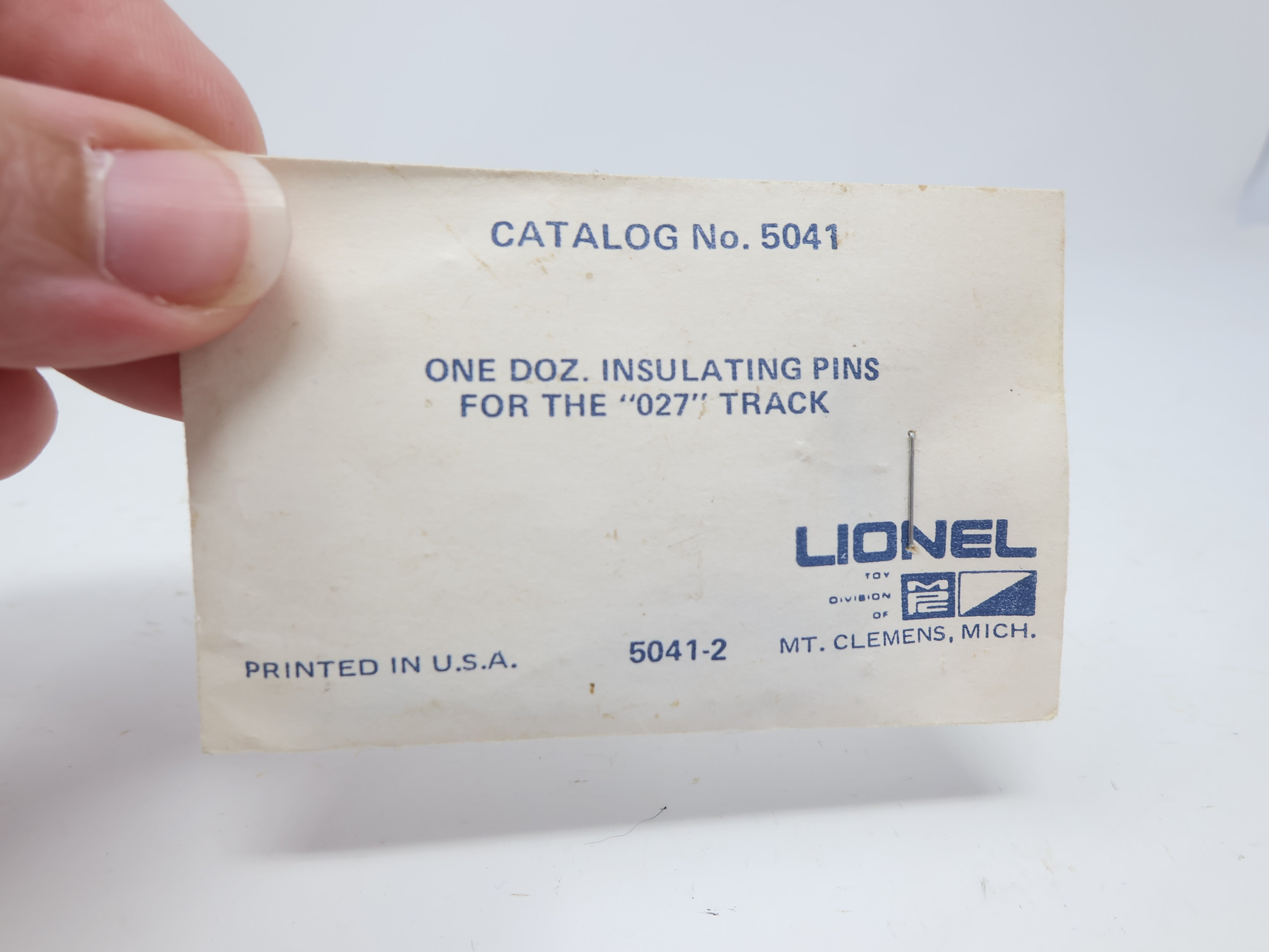 USED Lionel 5041 O, One dozen Insulating Pins for the "O27" Track