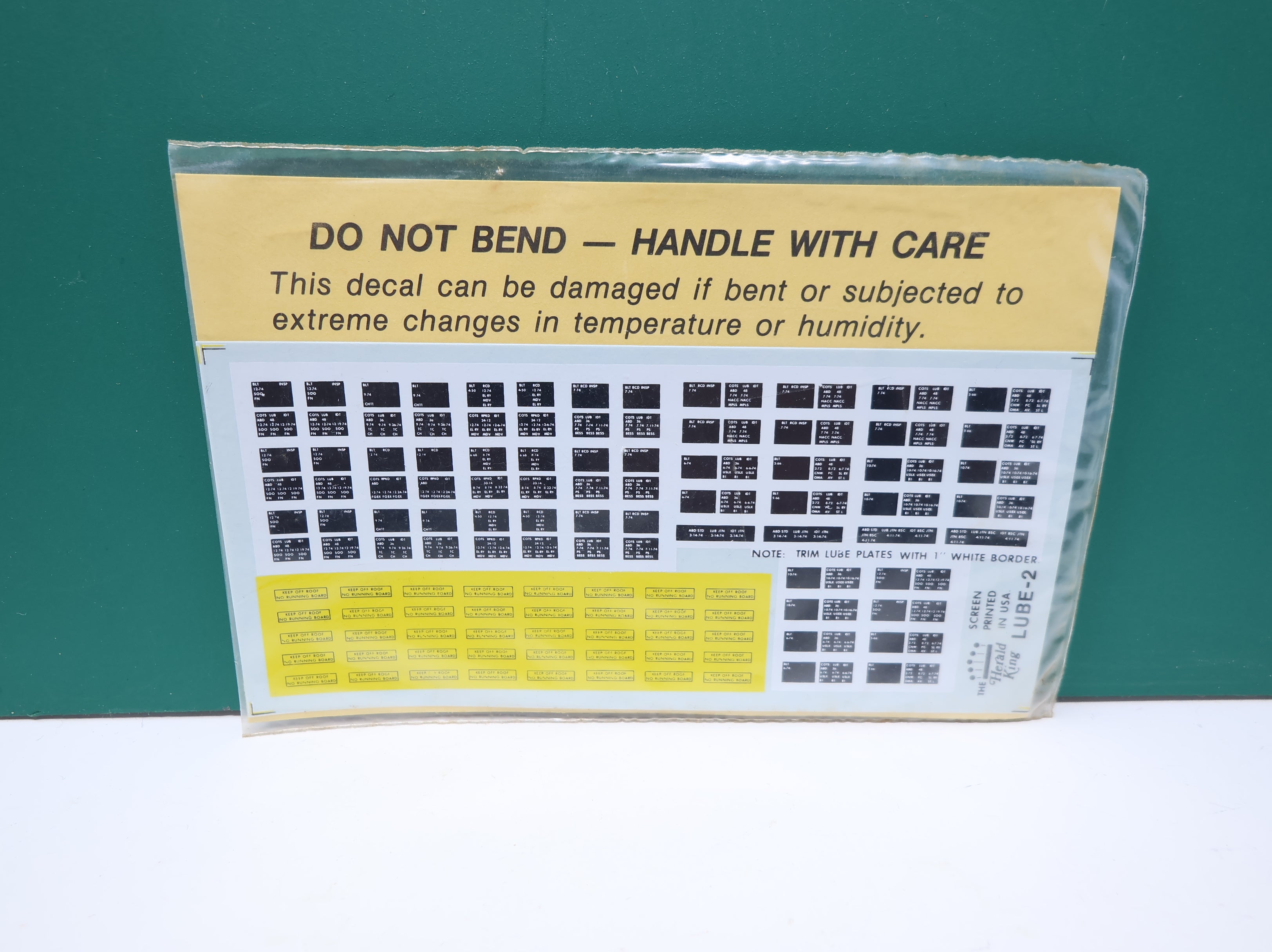 The Herald King HO Scale New Style Double Lube Plates "Keep Off Roof" Signs Decals Plates for 25 cars, Signs for 20 Cars.