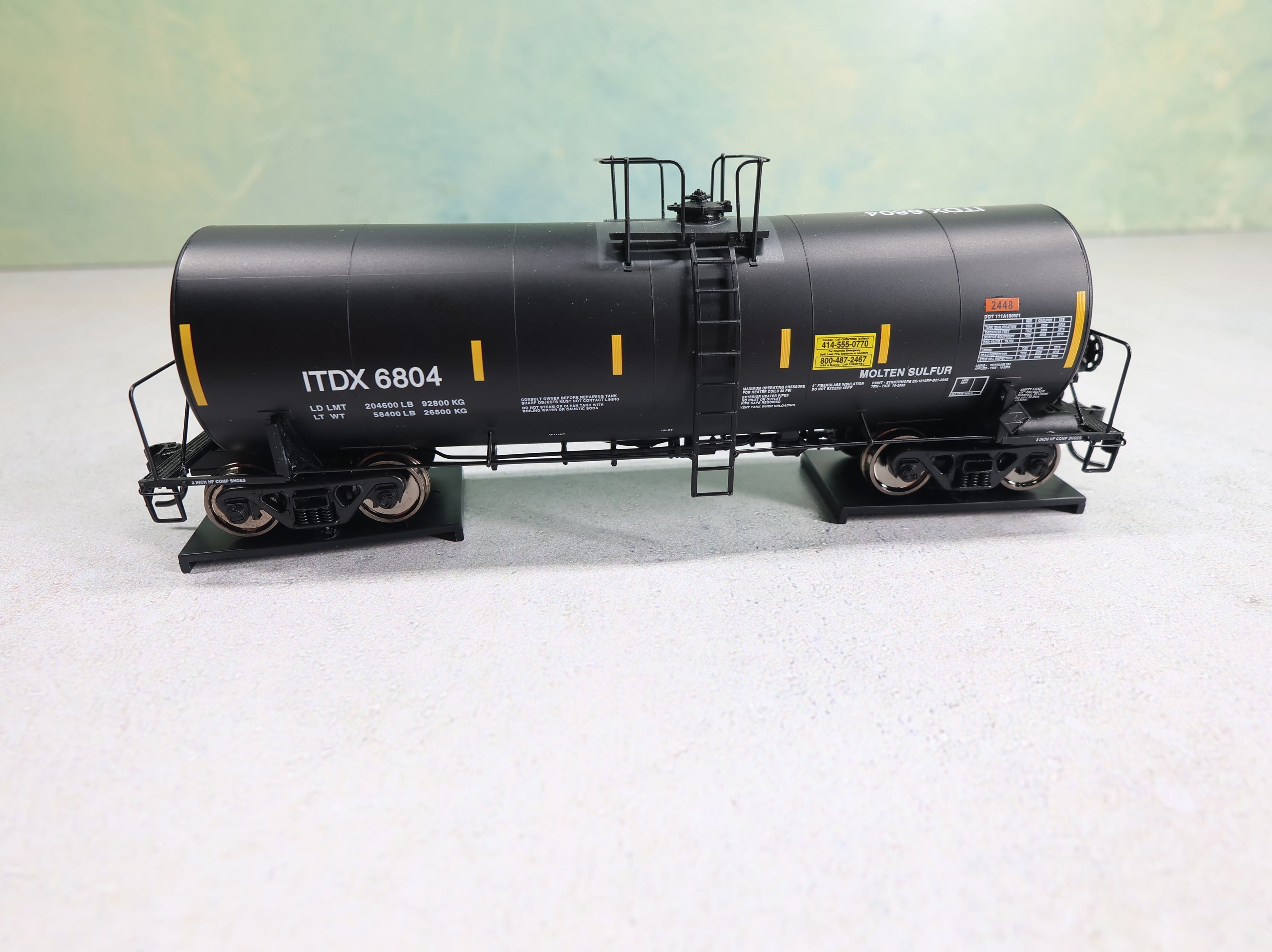 WalthersProto 920-100005 HO Scale 40' Trinity 14k Gal Molten Sulfur Tank Car Sulcom Inc ITDX #6806