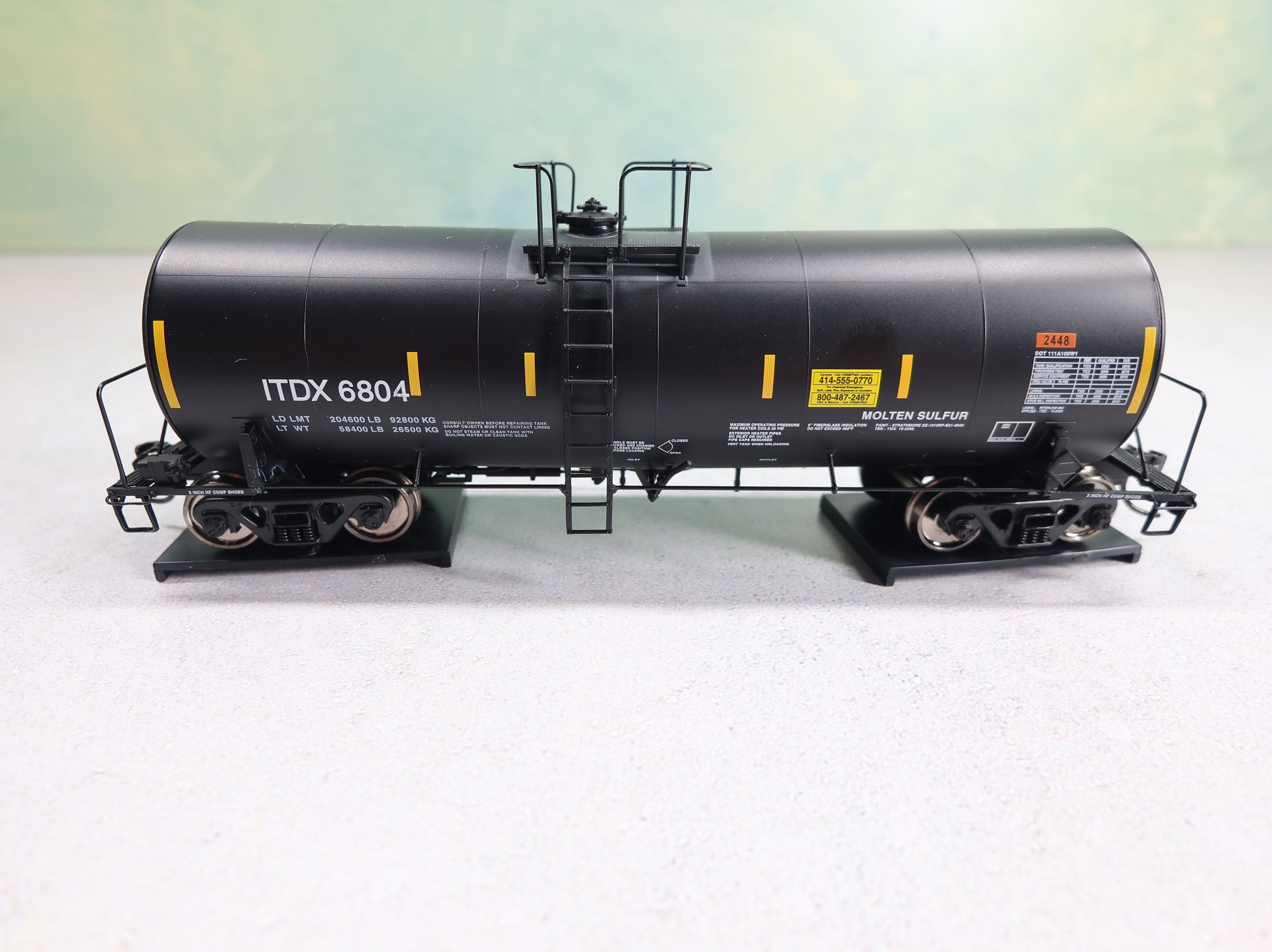 WalthersProto 920-100005 HO Scale 40' Trinity 14k Gal Molten Sulfur Tank Car Sulcom Inc ITDX #6806