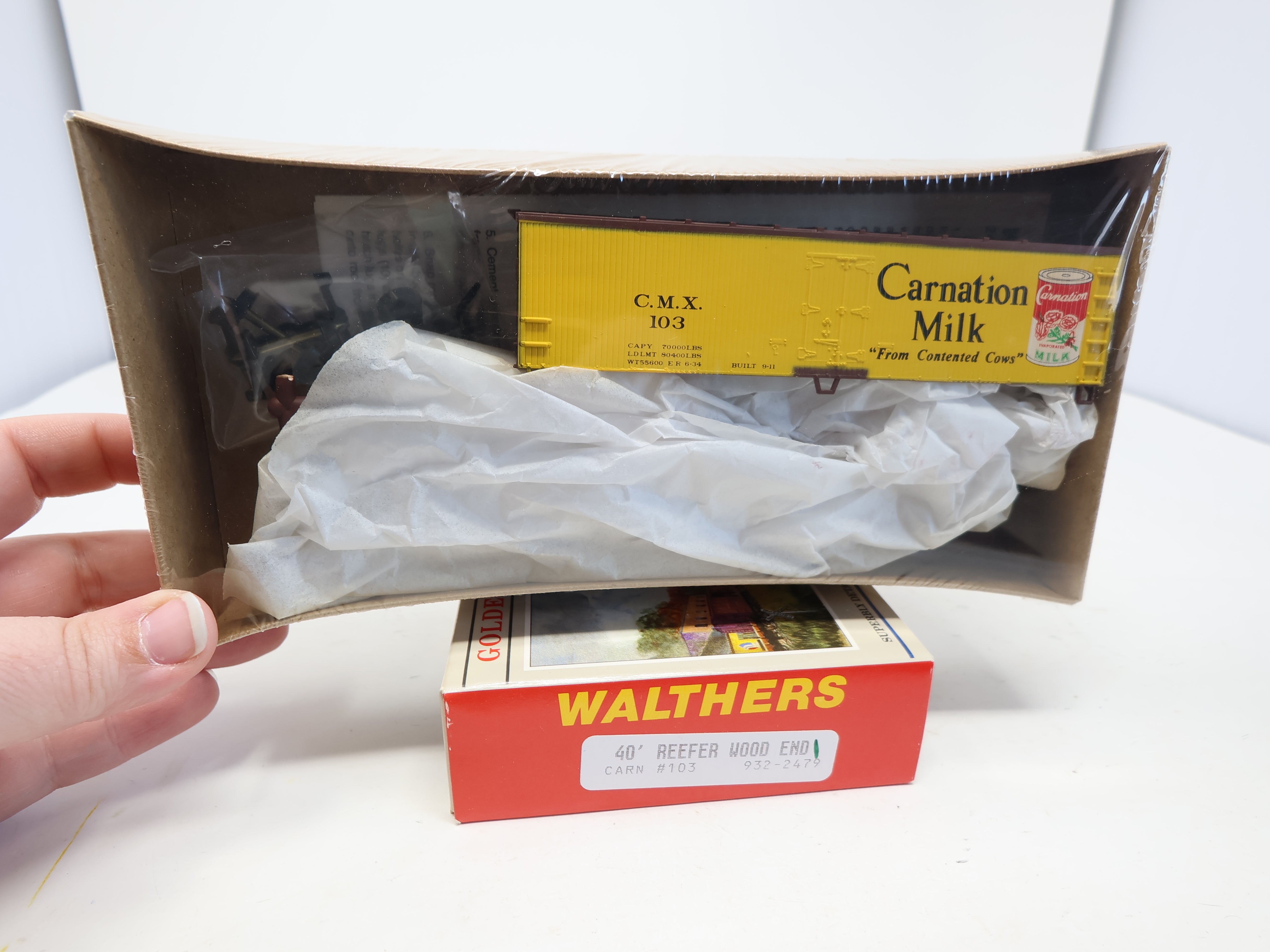 Walthers 932-2479 HO Scale, 40' Wood Reefer Billboard Box Car, Carnation Milk CMX #103 (KIT)